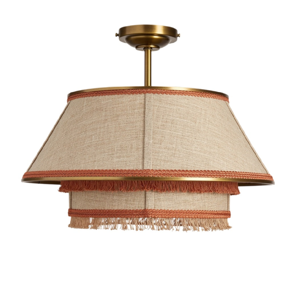 **Suspension en tissu beige avec finition frangée et bordure cuivrée**